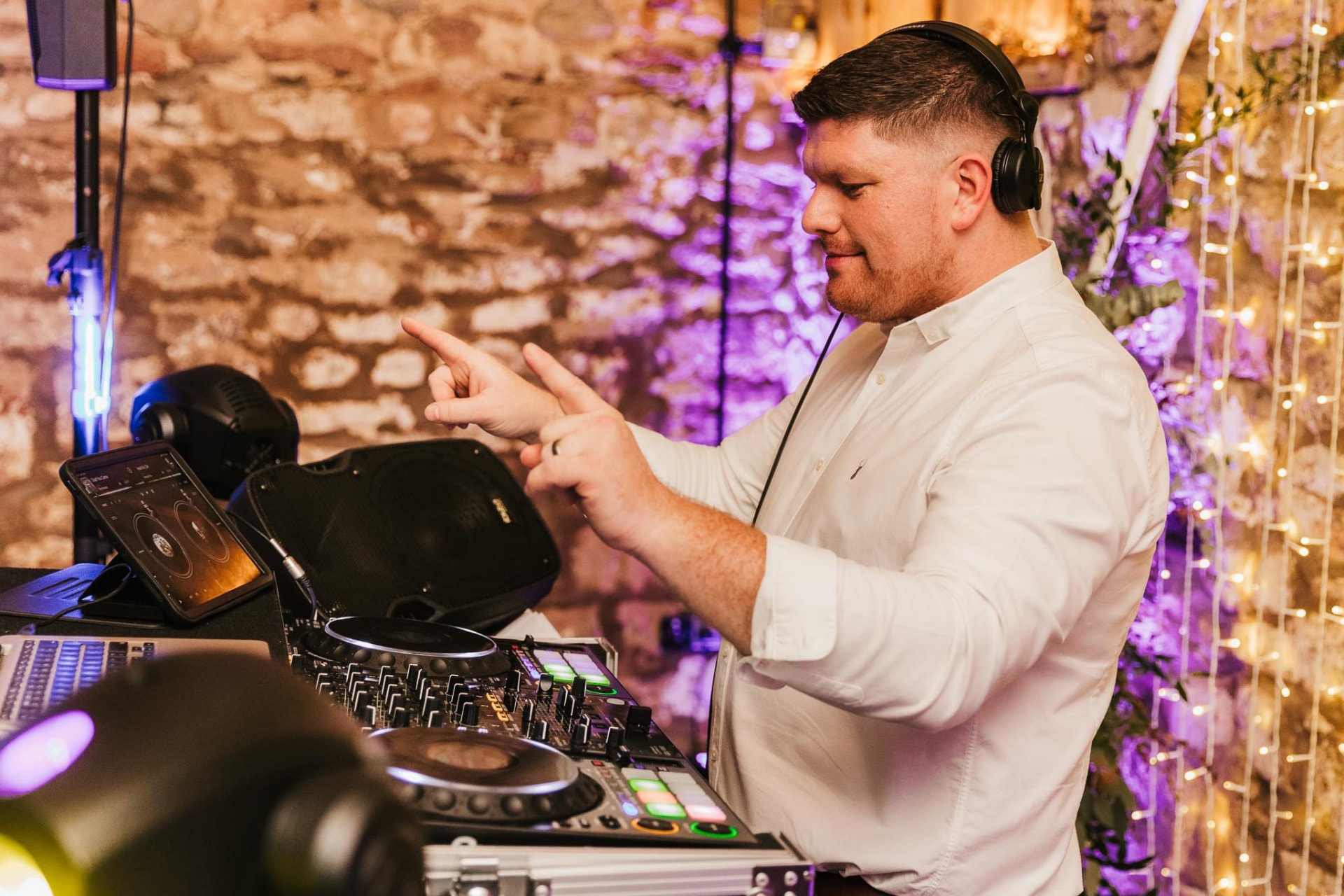 Jon DJing at a barn wedding