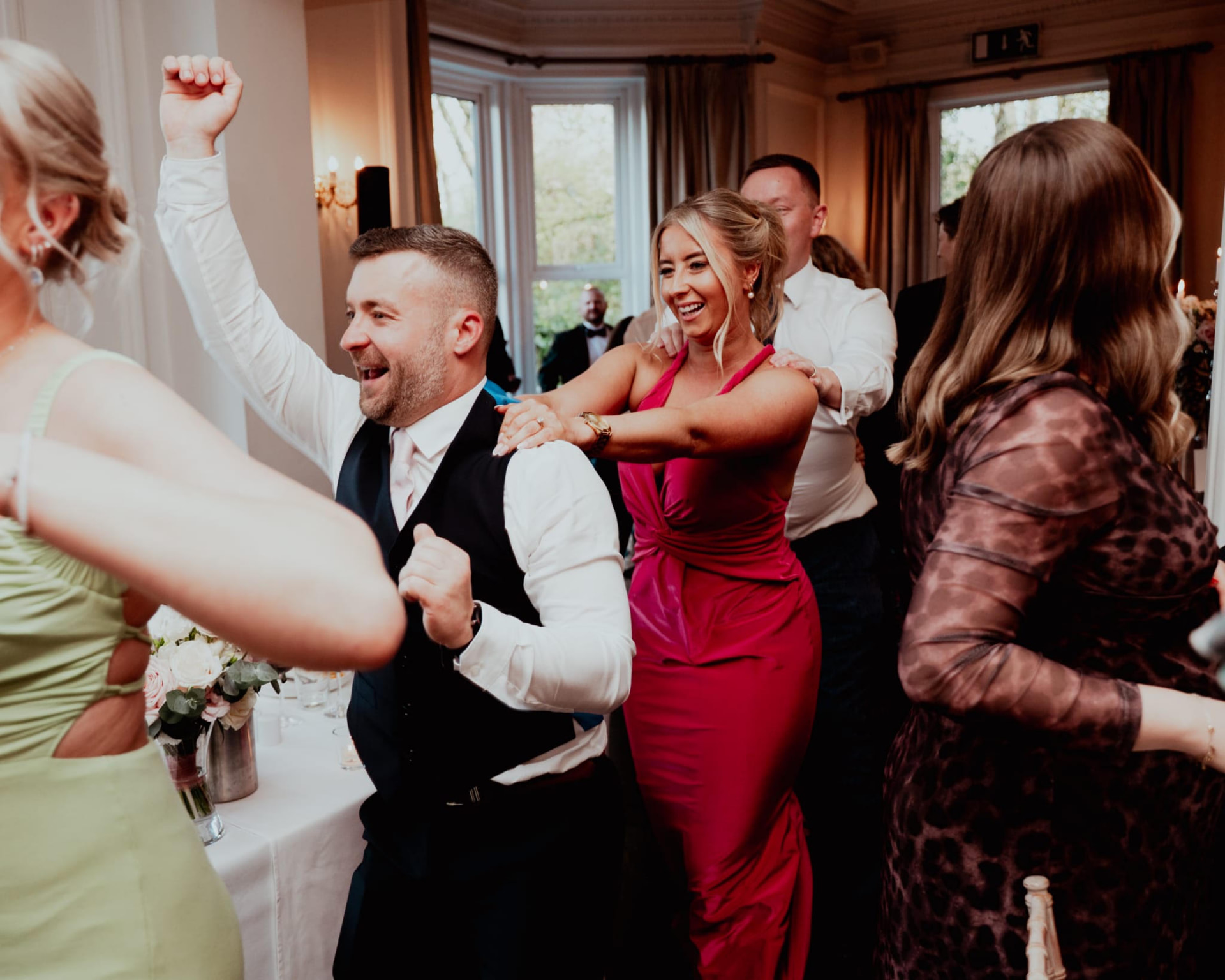 Guests dancing between the tables